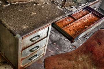 Deserted, rusted-out desk