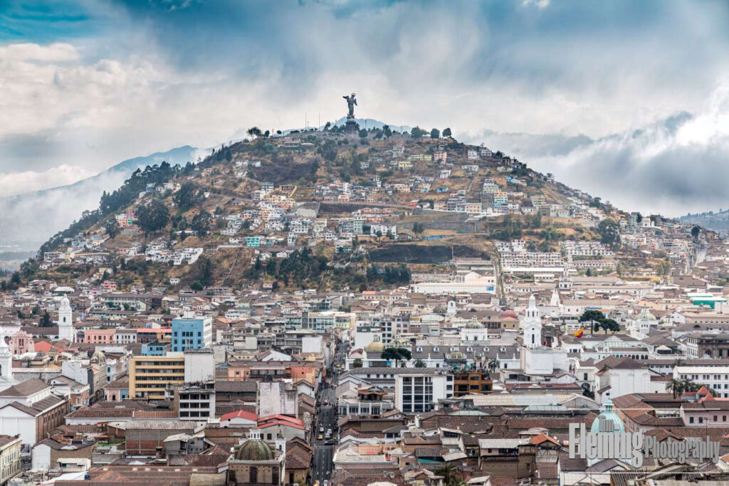 Panoramic View of Quito, Ecuador. Mountain and the famous Virgin of Quito statue