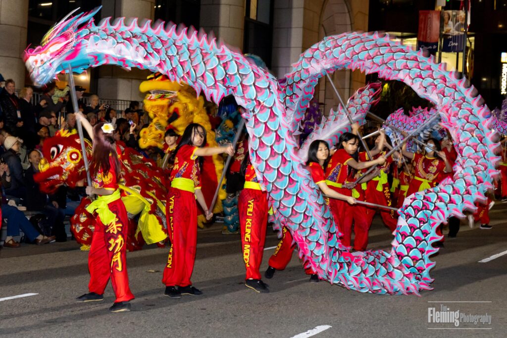Chinese New Year Parade performers with dragon
