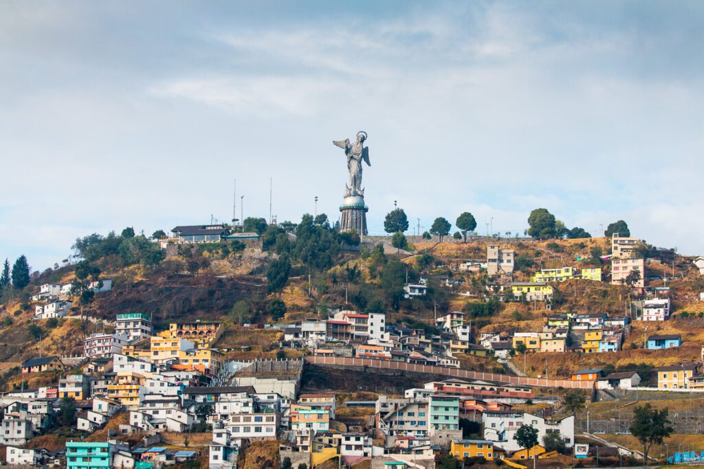 Panoramic view of El Panecillo hill with the Virgin of Quito statue in Ecuador.